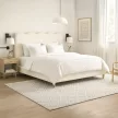 Pat 160×200 cm, crem, tapițat cu bouclé IZMIR
